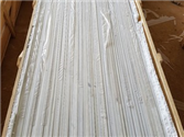 StaturioVN white marble window sills packed vertically in wooden crates