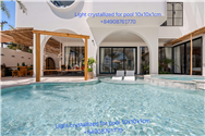 Luxury pool view featuring Light Crystallized coping and tiles at Chen Sea Resort and Spa