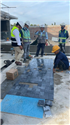 Engineers and workers inspecting Crystallized stone paving layout at Hoiana